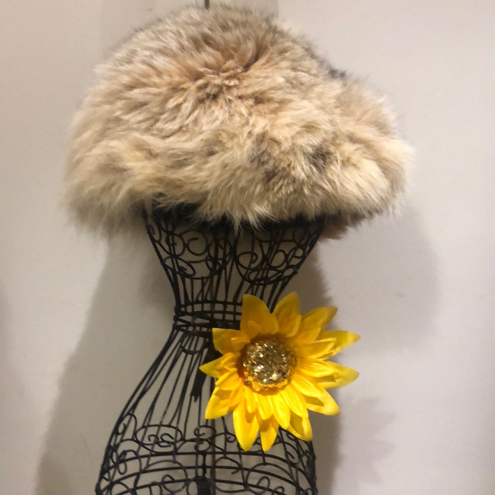 Fun, furry, so soft hat in beautiful, light shades, cream, beiges, and browns.